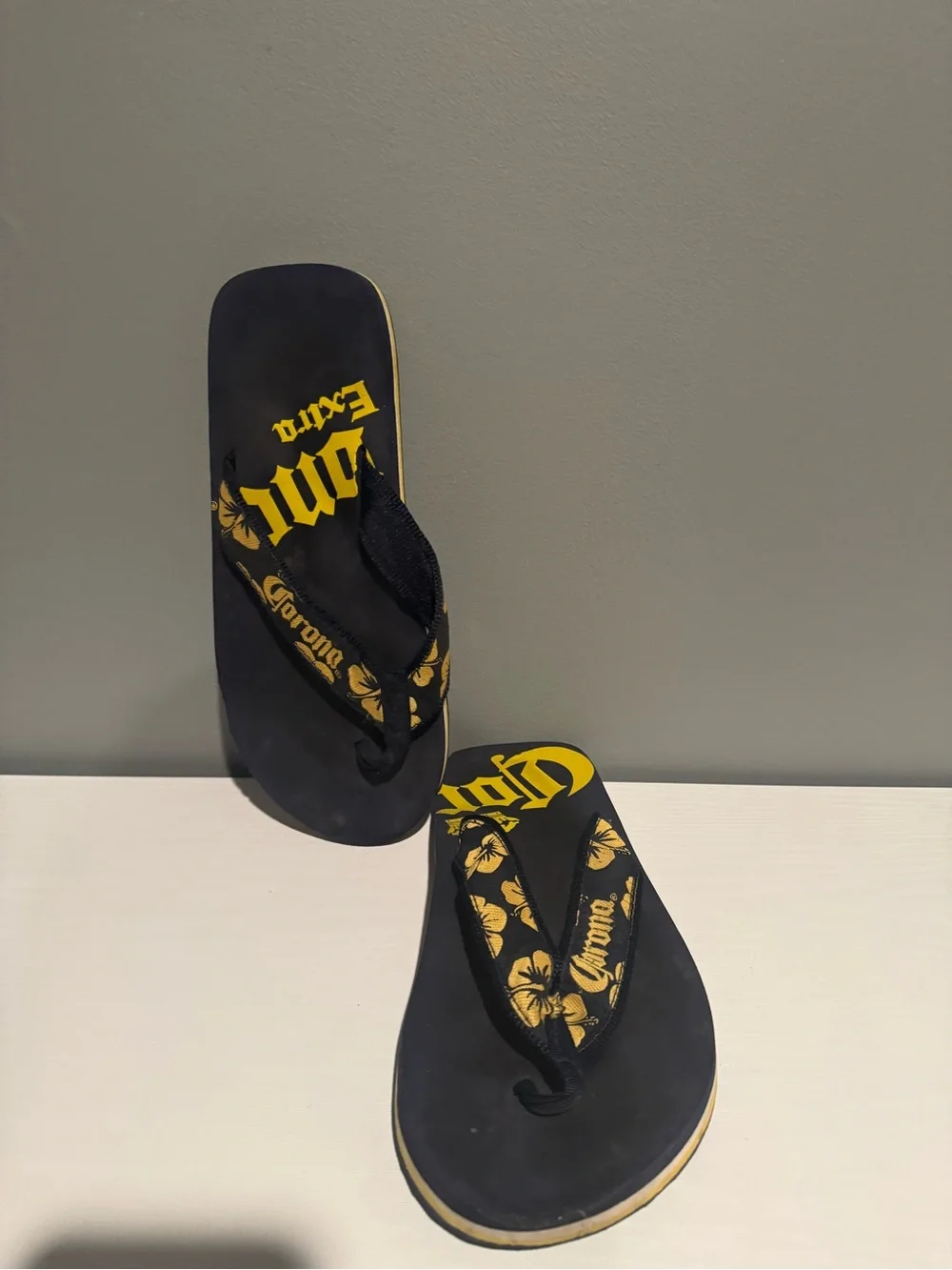 Corona Black and Yellow Hibiscus Flip Flops see photos for measurement
